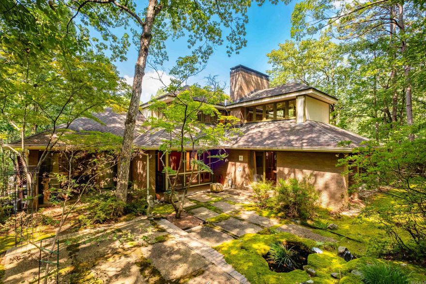 Discover an extraordinary opportunity to own a truly one-of-a-kind estate in the coveted, secure enclave of Hickory Hills. Built by Gary France and designed by a Chicago architect, this elegant three-story home sits on a sprawling 1.63-acre lot,  residence offering unparalleled space, privacy, and sophistication. The main level features a spacious primary suite with tranquil views & a spa like bathroom, formal dining room, and a sunlit great room w/ expansive picture windows framing the natural surroundings & a handsome fireplace. The gourmet kitchen is a chef’s dream, complete with top-of-the-line stainless Miele and Wolfe appliances, Sub-Zero refrigerator, & a cozy eat-in breakfast area. Step outside to an oversized deck that overlooks a beautifully landscaped private backyard & a sparkling pool. Upstairs, you’ll find two generously sized bedrooms & a versatile bonus room, while the lower level offers a welcoming den w/ wet bar, an additional bedroom & bath & another bonus space ideal for teens, guests, or in-law accommodations. For car enthusiasts or those needing ample storage, the property includes garage parking for up to eight vehicles plus dedicated space for an RV.