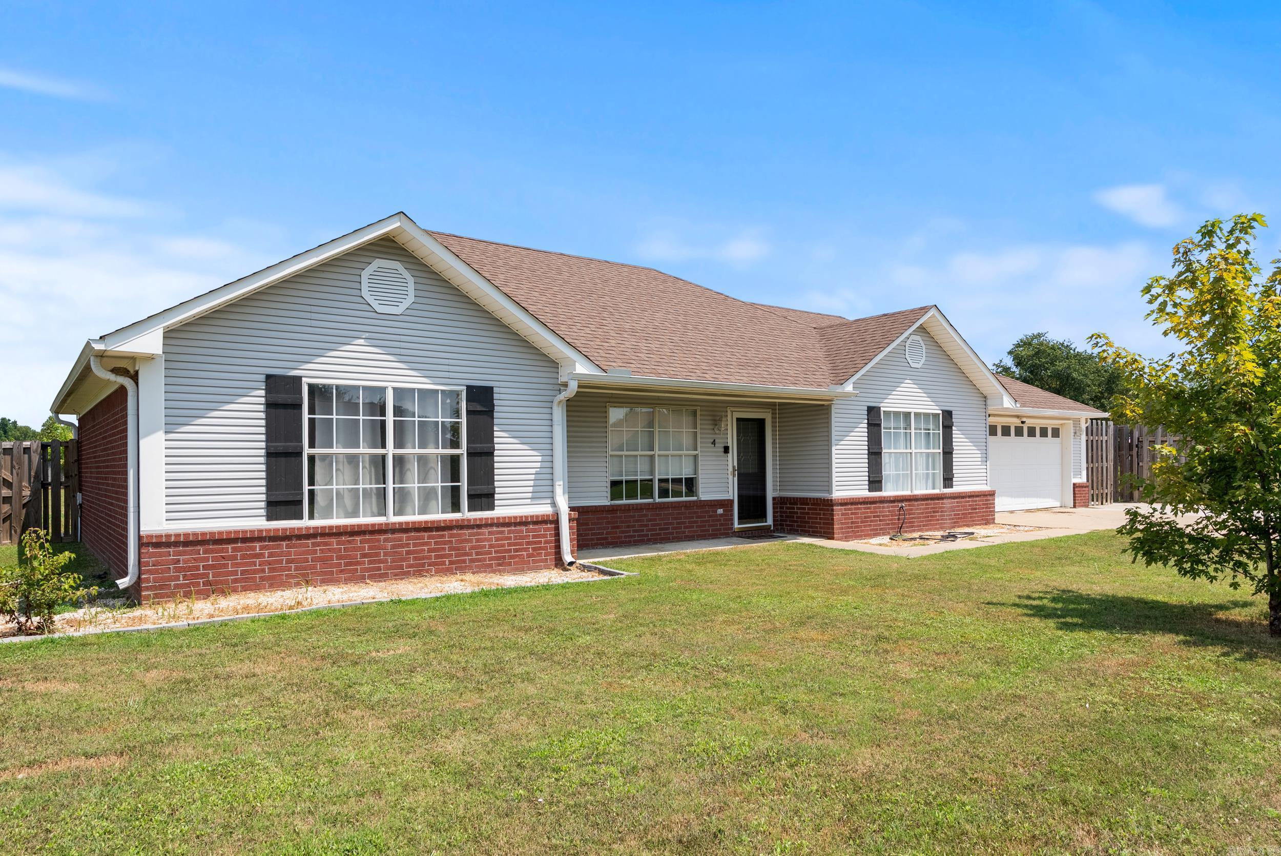 Great home located in the desirable Dove Creek subdivision in Vilonia, Arkansas, situated on an extra-large lot with additional parking space. This 3-bedroom, 2-bath home features a split floor plan for added privacy and over 1,500 sq ft of comfortable living space. The kitchen is equipped with beautiful Corian countertops, offering both style and durability. With its spacious layout, generous lot size, and convenient location, this property is perfect for those looking for both comfort and functionality. Give us a call today for a private showing!