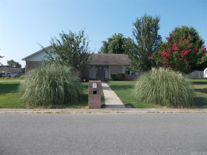 Spacious, cute home on corner lot. Landscaped yard, large living area features vaulted ceilings. Great kitchen with plenty of counter space, water filtration system. Wide hardwood doors to bedrooms, closets and baths allowing for wheelchair access. Windows let in natural light. Home is bright & super clean. Patio & partial fenced yard. New roof/shingles installed Dec 2016.