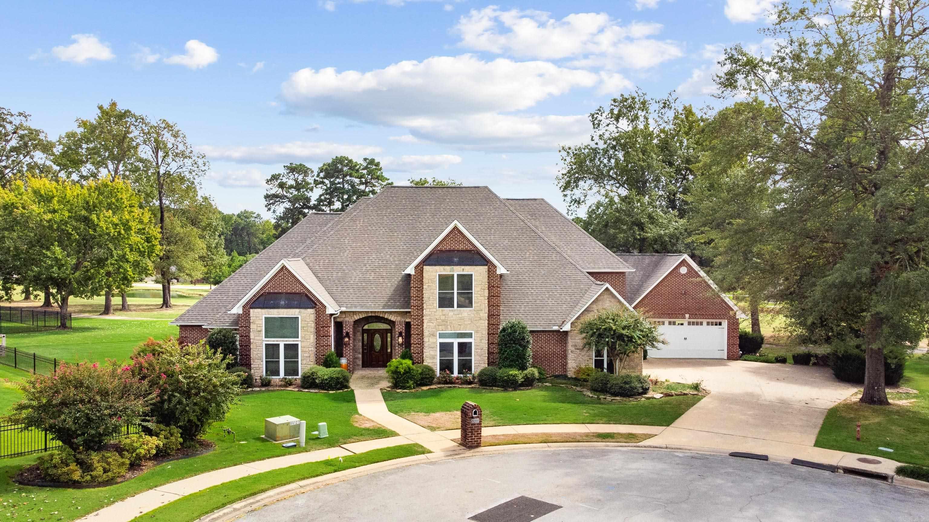 Stunning golf course home on the 11th hole of Longhills. Featuring a four car garage for all your vehicles and toys. Gorgeous firepit area and covered back patio. The sprawling floor plan offers generous sized rooms everywhere. Including an office with built ins and a workout room. The master suite features 3 walk in closets and a spacious bath layout. Each guest room has its own en-suite bathroom. SO many updates have been completed. Brand new paint throughout, all new carpet, and new fixtures and hardware.