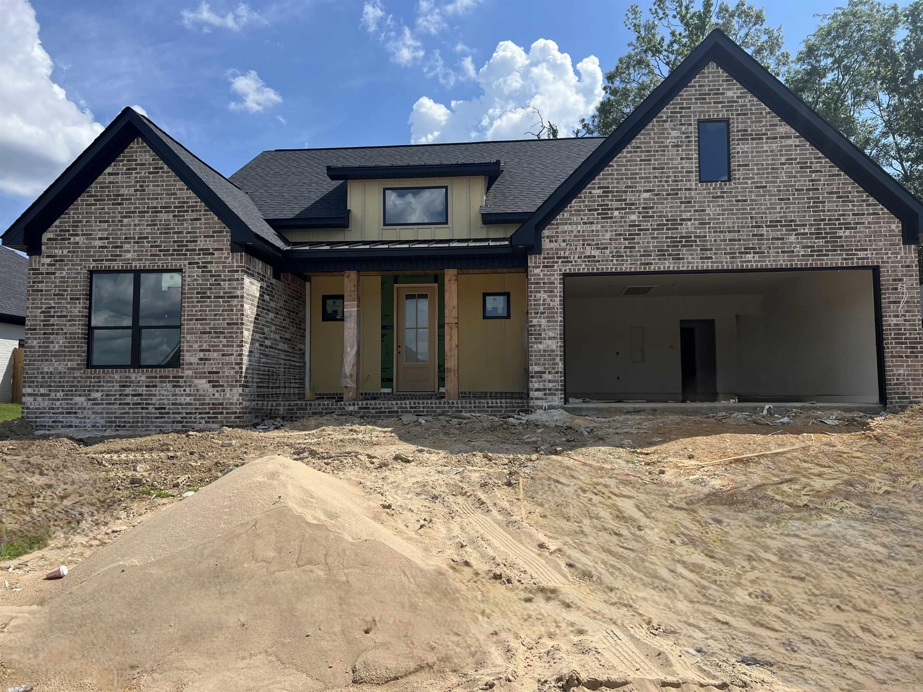 In one of the newest subdivision in Saline County is this nice quaint home in Coral Ridge Estates. This home has many many extras, such as an outdoor kitchen, upgraded lighting, no carpet, 12' ceilings tongue and groove ceilings, lots of extras you must see!