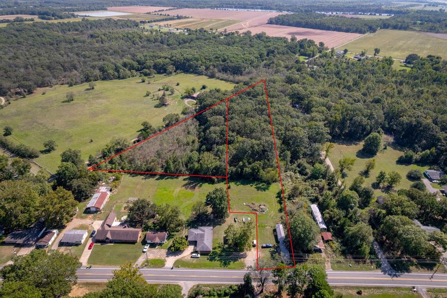 Are you looking for acreage that has income potential? If so, this is the spot for you. A little over 5.8 acres with a mix of open pasture and mature wooded areas. The property already has two tiny homes on it. One is completed and has been rented for the past 10 plus months. The other is partially completed. City Water and Electric already on the property.  This is a great investment opportunity that offers the perfect balance of privacy, open space, and convenience. Perfect for building, recreation, or hobby farming. Situated just off the main highway, this property provides quick access to shopping, dining, and schools while still offering the peace and quiet of the country. If you are interested in checking out this property, please give me a call today.