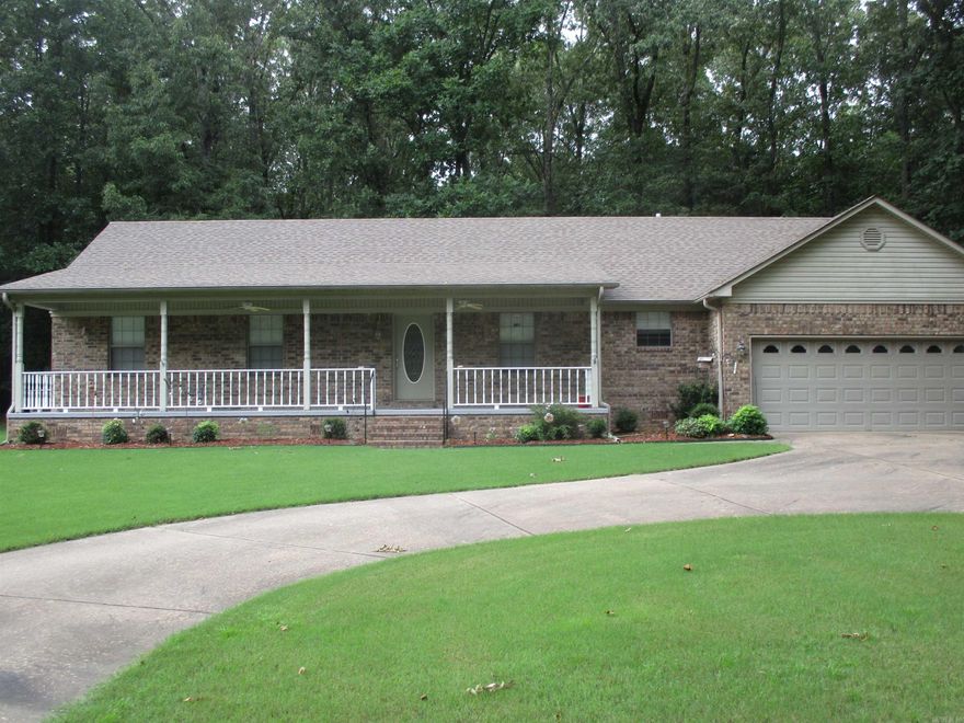 Beautiful and Well Maintained 3bd/2ba Home in the desirable Hidden Isle Subdivision. You are just across the street from Lake Conway and close to Paradise Landing. Concrete circle driveway, Roof 5 years old, HVAC is 1 year old and warranty conveys.  Beautiful hardwood floors, tile in kitchen and bathrooms.  There is a big Bonus room that could be a 4th bedroom or game room.  Breakfast area, main living room has fireplace and lots of natural light from windows.  Plenty of storage through out house.  Fridge, washer, and dryer all stay.  This is a great place for a new family or a home to retire in and enjoy the days at the lake.  This will not last long, so call me to get your showing scheduled.