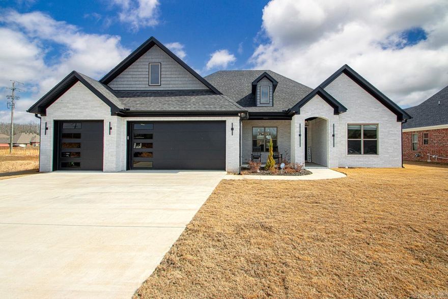 WOW! WOW! WOW! This home is better than new! What a Beauty! On the water!! Big covered back porch sitting on a large lot! Extra porch added! Fence! ADT system installed (water leak sensors, carbon monoxide detection, door alarms, cameras!) Fab~u~lous! Soaring ceilings! Wood beams throughout! Open floor plan! 4 bdrm, 2 1/2 bath w/custom touches everywhere! Kitchen has a double wall oven! (Cobalt blue on the inside! Take a peek!)! Microwave drawer! Crazy great! Custom granite that will amaze! Refrigerator stays! ETC! Get lost in the laundry room! (w/sink!) Washer/dryer neg! Beautiful lighting throughout! Separate dining room or perfect for home office!  Fireplace in family room and Primary bdrm!  Come see today! Every detail has been taken care of! Very well built w/tons of extras! Custom blinds throughout! WOW! WOW! WOW! See agent remarks...