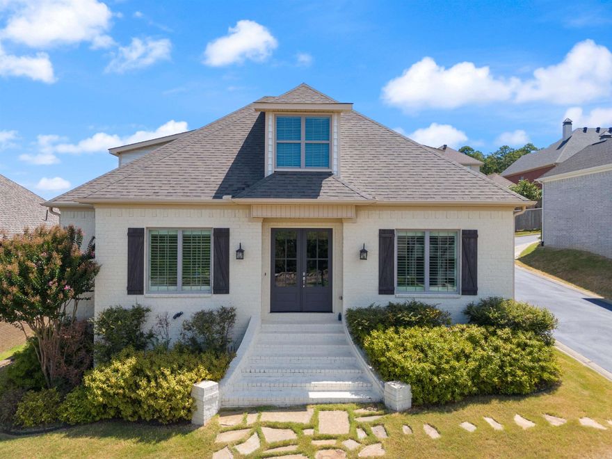 This beautiful Chenal Valley home is move in ready, positioned on a corner lot within minutes to the neighborhood pool, park and basketball courts! Move-in ready, this home boasts a spacious floor plan that seamlessly blends beauty with functionality. Welcome home through wooden front doors leading into the entry, office and dining room. Gourmet kitchen with granite countertops, a prep island, stainless steel appliances including a gas cooktop, double ovens, microwave, dishwasher, and a built-in refrigerator and freezer. Ample cabinet space with bar stool seating and a breakfast table area. The great room is open to the great room overlooking the backyard. The primary bedroom suite is located on the main level and offers a spa-like bathroom featuring a soaking tub, frameless glass shower, private water closet, and generous closet space.  Upstairs offers three additional bedrooms and a large hall bathroom. Back yard is fenced with a spacious deck and covered patio space perfect for drinking morning coffee or tea. Additional features include two-car garage, LED recessed lighting, plantation shutters and a laundry room with a sink and lockers. Come see this home today!