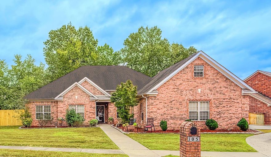 New Fence and Backyard Facelift.  This all-brick home blends comfort and charm with thoughtful updates throughout. The living room features coffered ceilings and a wood-burning fireplace with a gas starter, creating a warm and inviting space. New LVT flooring runs through the main living areas, and the kitchen boasts a large walk-in pantry and brand new dishwasher.. Enjoy year-round use of the heated and cooled sunroom. The oversized primary suite includes a sitting area, walk-in closet, jetted tub, and walk-in shower. A fourth bedroom and third full bath are set apart—ideal for guests or multigenerational living. The laundry room is spacious, and the double garage includes an electric attic lift for easy storage. HVAC replaced in 2023. A dry creek adds natural charm to the backyard.  Ample Parking with Large stamped concrete circle drive and parking pads.  Access to pickleball, pool, clubhouse, and more! Agents see remarks.