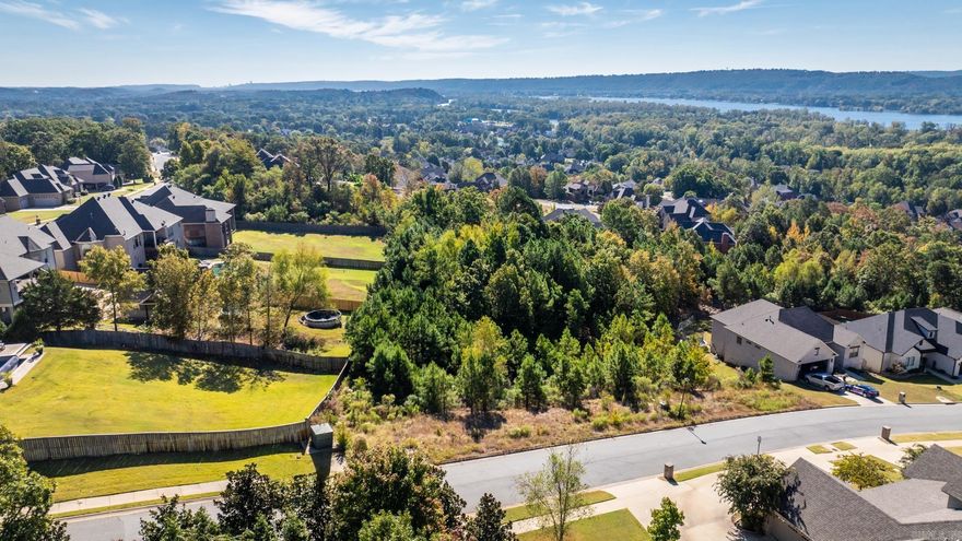 1/2 acre lot with RIVER VIEWS in established Maumelle neighborhood. Call your builder and start building your dream home today. Seller is also selling lot next door. Agents see remarks.