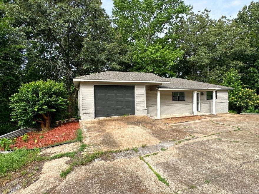 COMPLETELY REMODELED 2 story home at the end of the street! This 3 bed 2 bath, 1,536 sq. ft. home was built in 1995 and sits on 2 wooded lots at the very end of Meadow Heights. It's had virtually everything remodeled including paint, floors, fixtures and more! The home features an open living area w/ an upstairs living room, dining area & kitchen. The main bedroom, bathroom & laundry are also upstairs. Downstairs has 2 bedrooms, 1 bath and a large den that opens to a big private back deck looking out into the woods. The home also has a single car garage w/ an additional storage area. Compare this to the other options in its price range and I believe you'll be impressed!