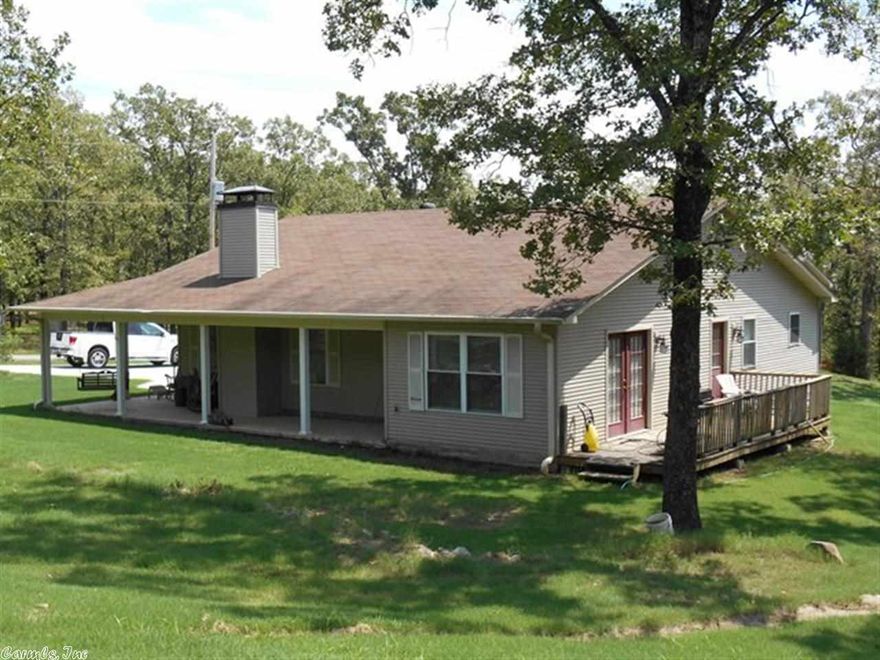 Quiet and secluded, this 2.5 acre setting sports a 3 bedroom home with two big outbuildings with electricity, water and RV parking. Mostly wooded, this property has Winter views, a wrap-around porch and plenty of parking area. Tile, wood and carpeted flooring are featured in this functional floor plan with wood burning fireplace. Make this one yours!