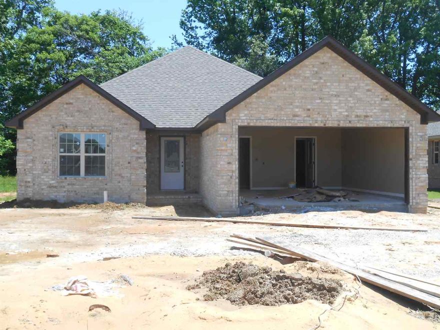 New construction home featuring 3 bedrooms and 2 baths, open floor plan with an eat-in bar, covered back porch off the dining area.  Beautiful acid stain floors throughout the home, double walk in closets in the master bath with jet tub and much more.