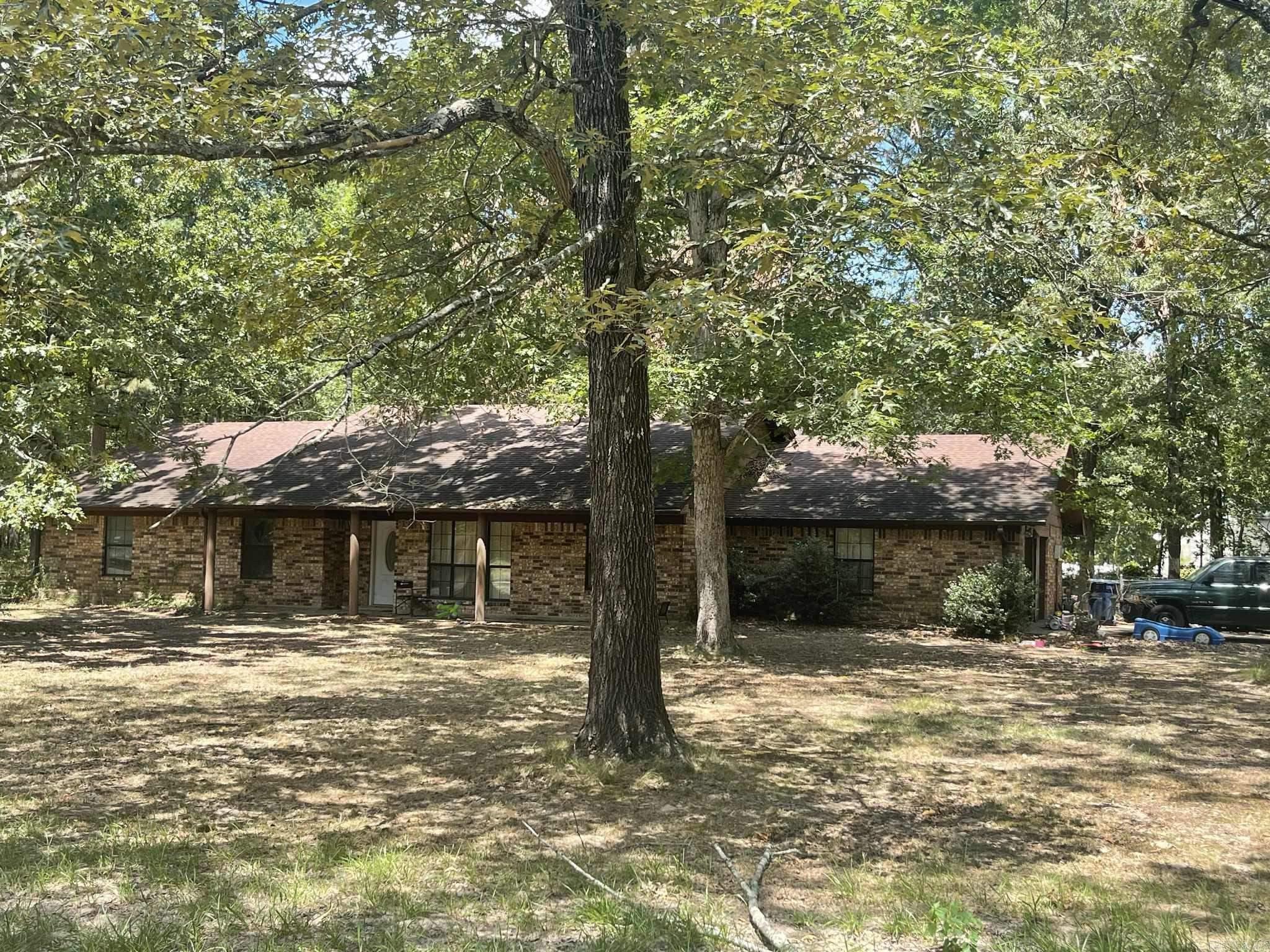 Welcome to this maintained 4-bedroom, 2-bath brick home situated on a spacious 1-acre lot. This charming residence offers a perfect blend of comfort and functionality, ideal for families or those seeking a peaceful retreat. The home includes four spacious bedrooms, each designed with comfort in mind. The primary suite offers a private oasis, The additional three bedrooms are versatile and can serve as guest rooms, home offices, or playrooms. The outdoor space is a true highlight, with a sprawling 1-acre yard that provides endless possibilities for gardening, recreation, or simply enjoying the serene surroundings. The brick exterior not only enhances the home's curb appeal but also ensures durability and low maintenance. Located in a peaceful neighborhood, this property offers the perfect balance of privacy and accessibility to local amenities. Donāt miss the opportunity to make this beautiful brick home your own!