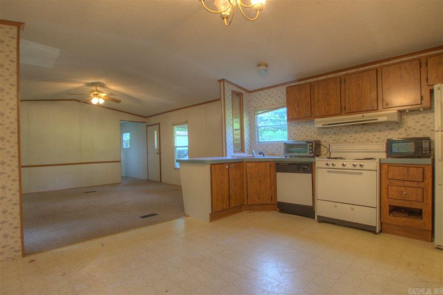 3 bed / 2 bath with beautiful view of winding brook in a light stand of trees from back deck. $750 per month with $500 security deposit, non smoking home. Built in 1996. All of this in Genoa ISD