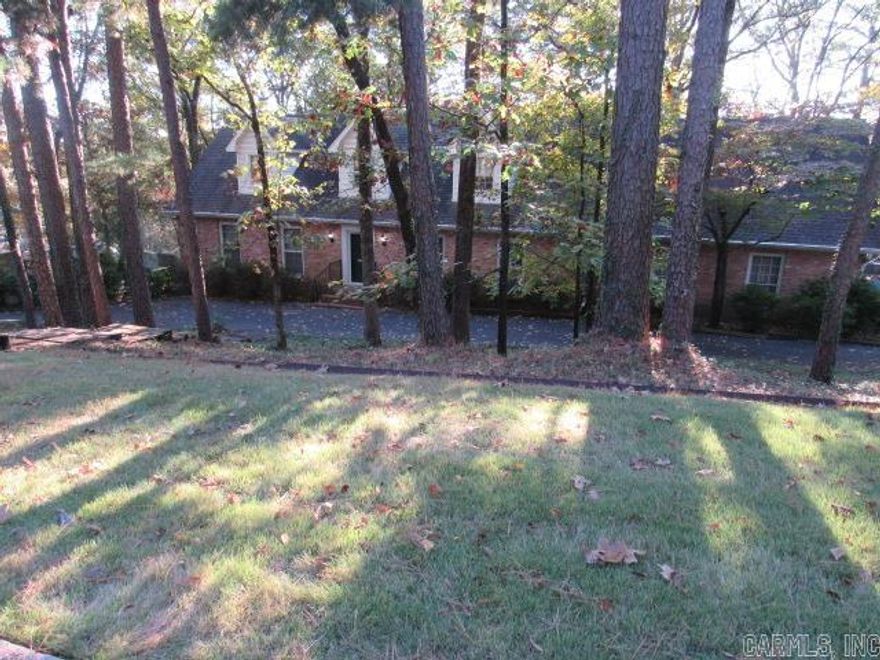 Solid Pleasant Valley home on 3/4 acre lot custom built by one-owner, mechanical engineer. 6 bedrooms with 3 1/2 baths on 3 levels.  Tons of storage throughout the house.  The primary bedroom, den w/ gas log FP, kitchen, living room, dining room, garage and laundry are all on the main level w/ 2 car side-loading garage. Downstairs you will find 3 bedrooms, 1 bath and large family room w/ 2nd fireplace; downstairs all recently updated with LVP flooring and paint. Upstairs you will find 1 large bedroom & bath plus over 650 square feet of walk-in attic storage; could be more bedrooms or bonus room.