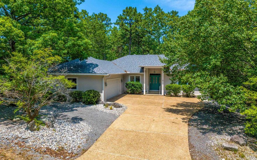 Beautiful and Modern 3 BR 2 Baths with Thoughtful Updates New Roof in 2023 2023 Gas Stove & Dishwasher New Hardwood and Tile Flooring Fenced Backyard Deck with Screened-in Porch New (2026) Hot Water Heater     One Time Buy-In fee for those who do not already own property in Hot Springs Village