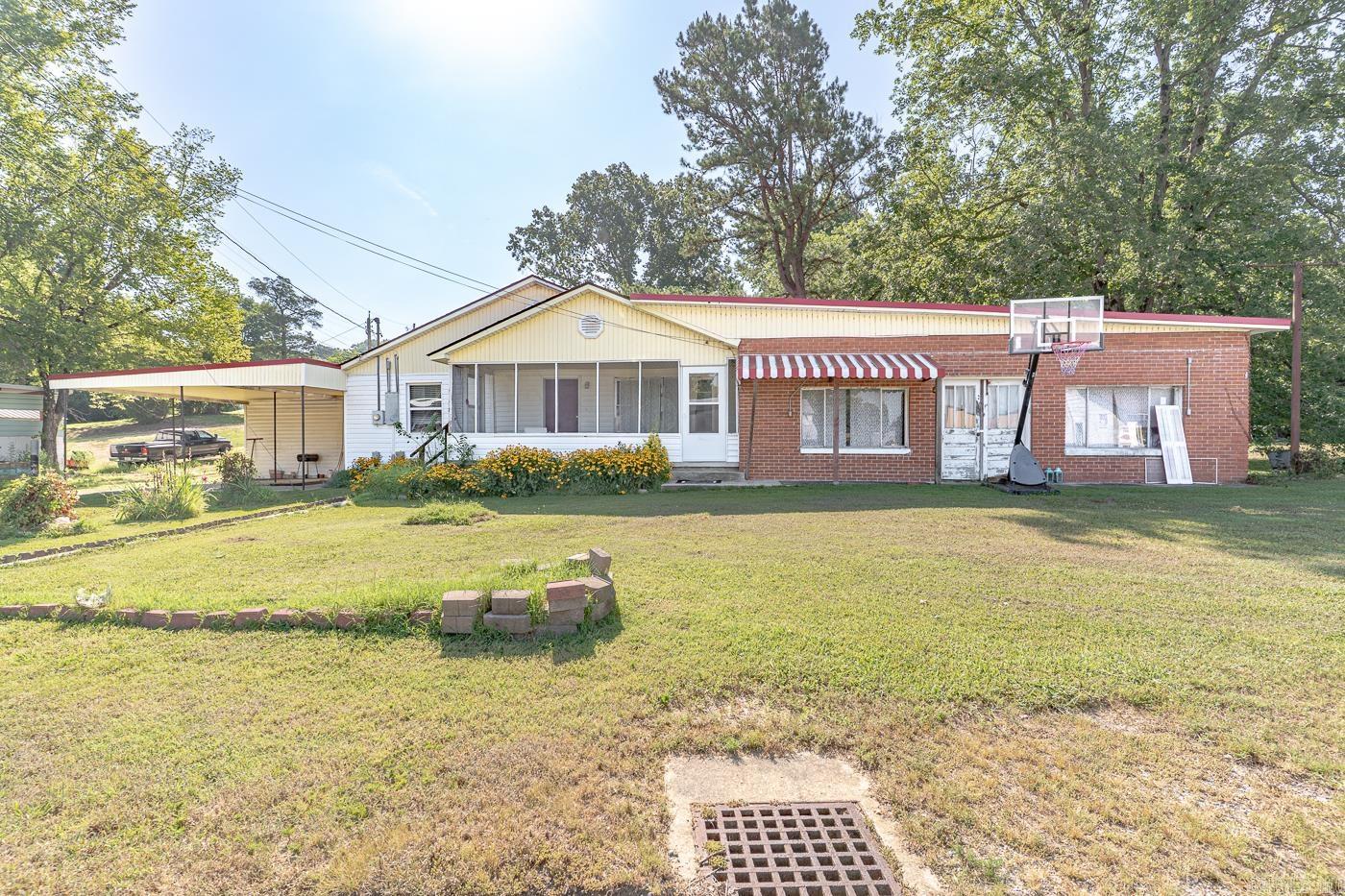 New Listing! Welcome to this charming 3 bedroom, 1 bath home offering 1,410 sq ft of comfortable living space on a spacious 0.45-acre lot! Step inside to find a large living room and an eat-in kitchen perfect for gatherings. Enjoy your mornings on the screened-in porch or unwind in the generous backyard-ideal for outdoor entertaining. This home also features an attached building that offers excellent storage or potential for additional living space. Recent updates include a new roof in 2022 and most of the windows are new and new siding on the front of the home. Located just minutes from Lake Walcott, this property combines peaceful living with convenience. Sold "AS IS" don't miss your chance to make it yours!