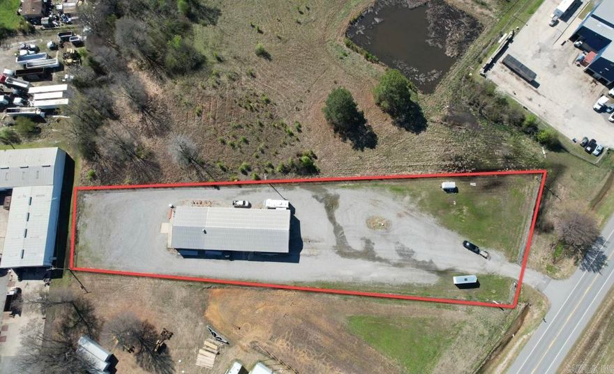 Situated within the city limits of Searcy and minutes from HWY 67/167, accessibility is an advantage. The office space is complete with a kitchen that is both heated and cooled, a full bathroom and setup for a washer and dryer. Additionally, the property boasts a heat-equipped back bay, making it suitable for various operations. The loading dock at the front facilitates easy handling of goods, while the packed gravel lot ensures durability and ease of access for vehicles. Security is paramount, with the entire property enclosed by a robust fence enhanced with razor wire. The wash bay located in bay number 3 is an excellent feature for businesses that require cleaning facilities. Furthermore, the property includes a septic separation system, promoting efficient waste management. The generous bay doors, measuring 23x12 feet, provide ample space for large equipment and vehicles. The inclusion of 3 phase power in the shop enhances its capability to support heavy-duty machinery, making this property a prime choice for businesses across various industries. Let's go check it out today! Seller may consider lease options or owner finance. Check with LA for details.