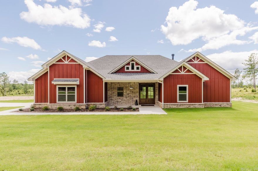 Tucked away in the esteemed heart of the Timber Wood subdivision, this exquisite 1.76-acre estate epitomizes contemporary elegance. This newly constructed marvel, adorned with meticulous craftsmanship and premium features, is truly a dream realized. Boasting 4 bedrooms and 3 bathrooms, this residence offers an ideal blend of space and comfort.  Set within the prestigious Bryant School District, this home transcends mere residence, offering a refined lifestyle upgrade. Every facet of its design exudes sophistication—from its graceful aesthetics to its bespoke craftsmanship.  The open-concept layout unveils a culinary masterpiece of a kitchen, fit for a chef, with luxurious finishes and thoughtful functionality. Enjoy soft-close cabinets and pristine quartz countertops, among other top-tier elements. The primary suite enchants with tray ceilings accented by stained wood insets, and the ensuite bathroom features a sumptuous tub and a walk-in tile shower. A generously-sized walk-in closet seamlessly connects to the laundry room, enhancing convenience.  Relish the serenity of your private retreat, as the property backs onto tranquil green space, allowing you to savor nature’s splendor