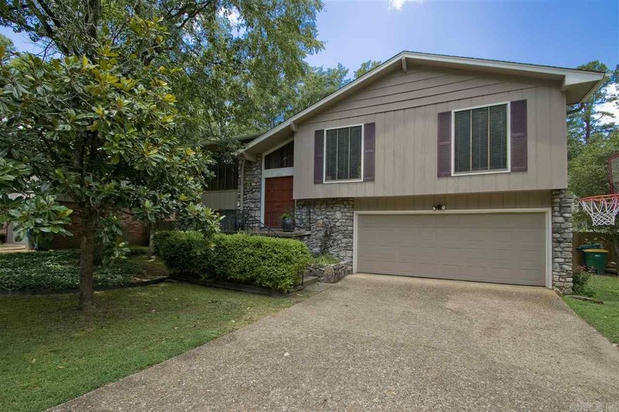 Move-in ready house in Roberts school district! This bi-level home has a large fenced in backyard with storage bldg, patio under the deck and separate fenced area for pets. On the main level there is a living area and dining space opening to the large kitchen. French doors open to the newly painted deck overlooking the yard. 3 Bdrm & 2 Bath on main.  Downstairs has a second living area with wood burning/gas starter fireplace and wet bar, 4th bedroom or playroom and laundry room. 2 car garage. Come see!