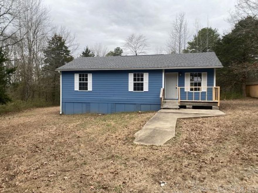 Spacious 2 bedroom 1 bath updated home with large open floorplan on level lot with trees in Drasco Arkansas. SEE AGENT REMARKS