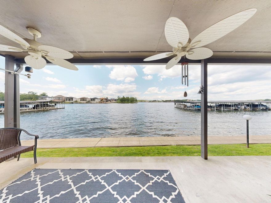 Investment!!  Lake Front/ Water Front. Experience the ultimate lake lifestyle in this stunning lakefront/waterfront condo on Lake Hamilton. This fully furnished unit is move-in ready and features a covered boat slip, making it a dream for water enthusiasts. Enjoy breathtaking views and seamless access to the lake. The interior is thoughtfully appointed.  Offering a turnkey opportunity.  Located in a gated community with premium amenities, this is lakeside living at its finest.  200 Hamilton Oaks M-1, Condo (South Shore HPR)  2 Bedroom, 2 Bathroom  approx. 1308  square feet. Amenities: Covered Boat Slip, Swimming Pool, and Gated Entrance.