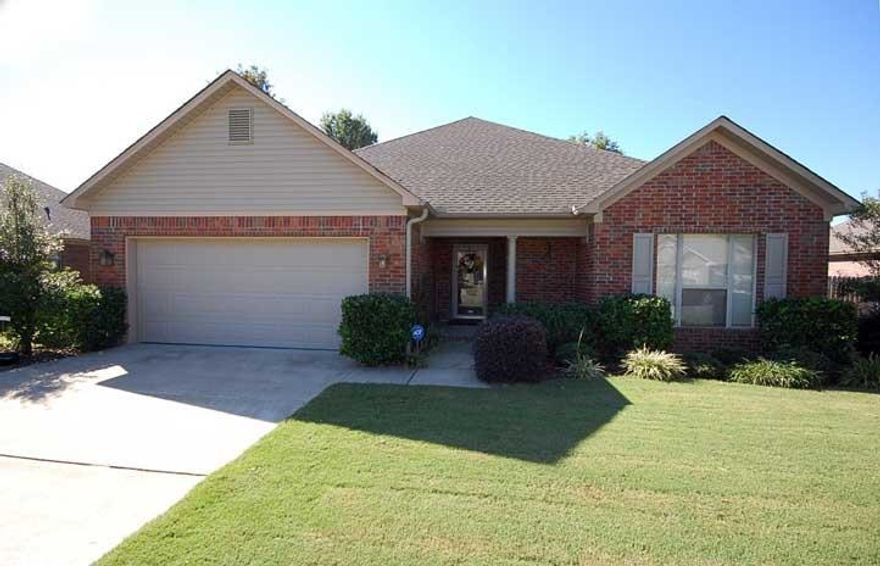 Nice home with a large eat in kitchen. Living room has built in on both sides of fireplace. Both baths have double sinks. Covered porch.