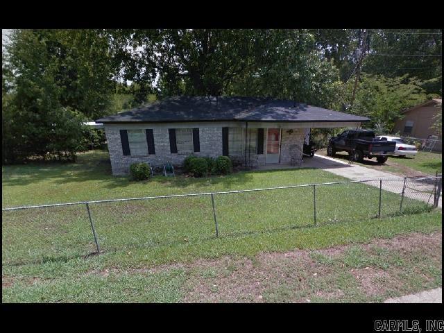 CORNER LOT HOME IN BELAIR NEIGHBORHOOD!! This Cozy 3 Bedroom And 1 Bath Home Features Over 950 Sqft! Range Will Be Provided In Kitchen! Hookups For Washer And Dryer! Fully Fenced Yard! 1 Car Carport For Parking! PET FRIENDLY!! DIRECTIONS: From I-30 E, Take Exit 131 Toward Chicot Rd. Turn Right On Chicot Rd, Right On Morris Dr, And Left Onto Tela Dr. Home Is On The Left! AVAILABLE EARLY OCTOBER 2025!!!