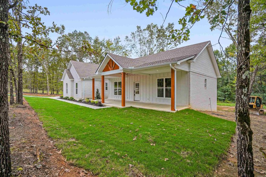 Brand new construction on 1 Acre in Vilonia! This beautifully crafted 3-bedroom, 2-bathroom home is one of three exclusive homes built on Sellers Road by the reputable Emerald Custom Homes—and it's ready for its new owners! With 1,768 sq ft of thoughtfully designed living space sitting on a sprawling one-acre lot, this home blends modern comfort with country charm. Step inside to enjoy tall ceilings that add an open, airy feel and a spacious kitchen featuring a walk-in pantry and an abundance of cabinet storage—perfect for home chefs and entertainers alike. Whether you're looking to settle down or upgrade your lifestyle, this home offers the space, quality, and tranquility you’ve been searching for—all just a short drive from local schools and amenities. Tax data for lot only. Schedule a tour now!