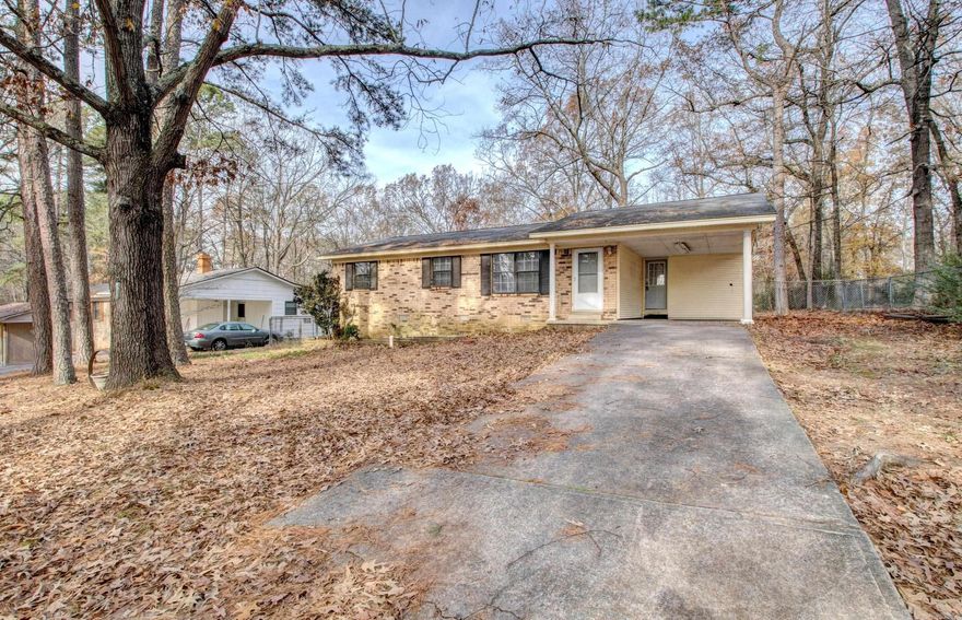 Move in ready 4bed 1.5 bath home features all solid service floors, large back deck with enclosed area, one car carport in a tree shaded subdivision. Agents see remarks.
