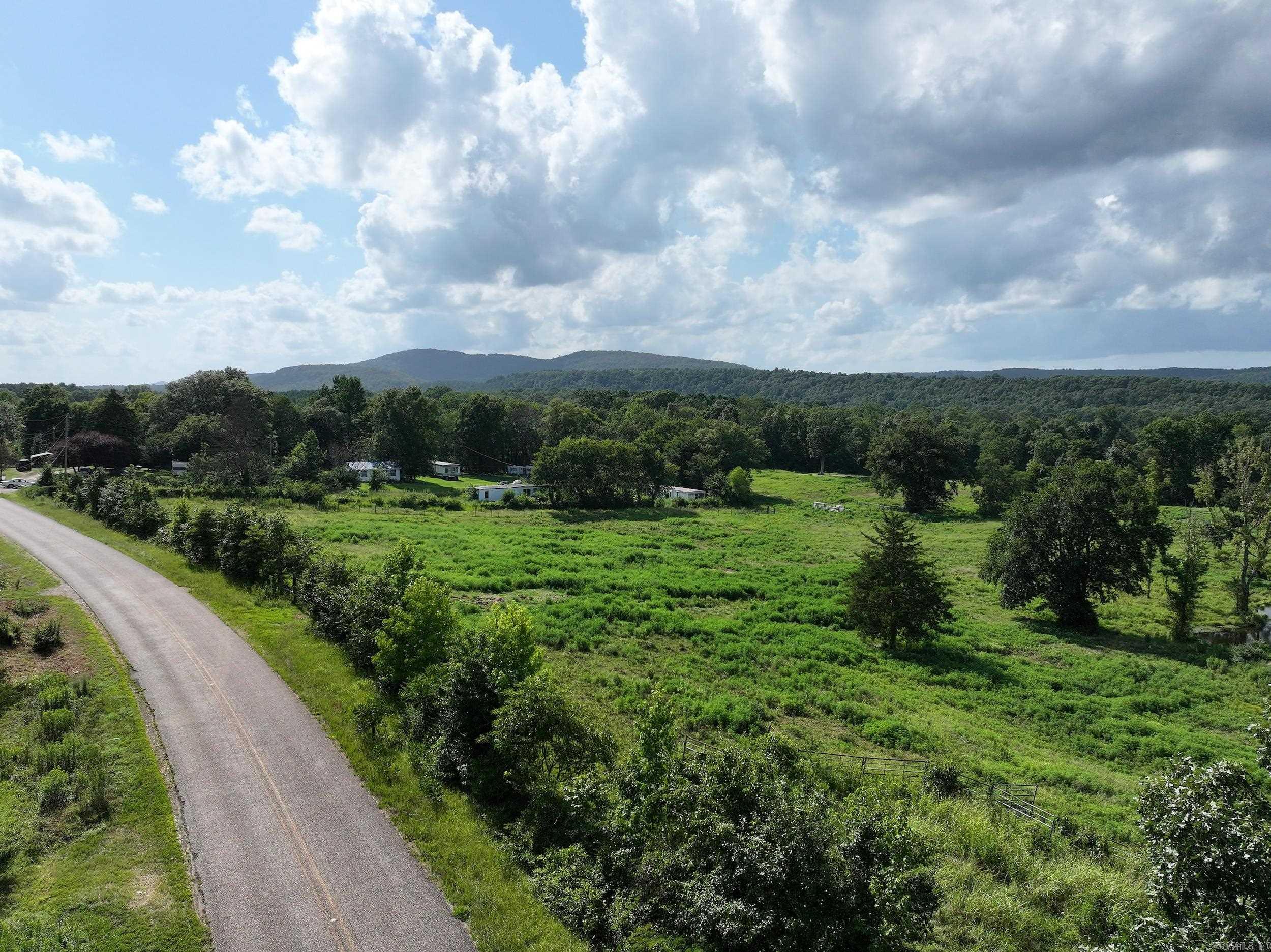 62± acres on Rock Creek Road in Glenwood, AR featuring gorgeous rolling pastureland, a serene pond, and stunning mountain views. Just minutes from Glenwood and a short drive to Hot Springs, this versatile property offers multiple possibilitiesāwhether you're looking for recreational land, future development, or a place to build. Easy access with plenty of open space to enjoy the natural beauty of the Ouachitas.