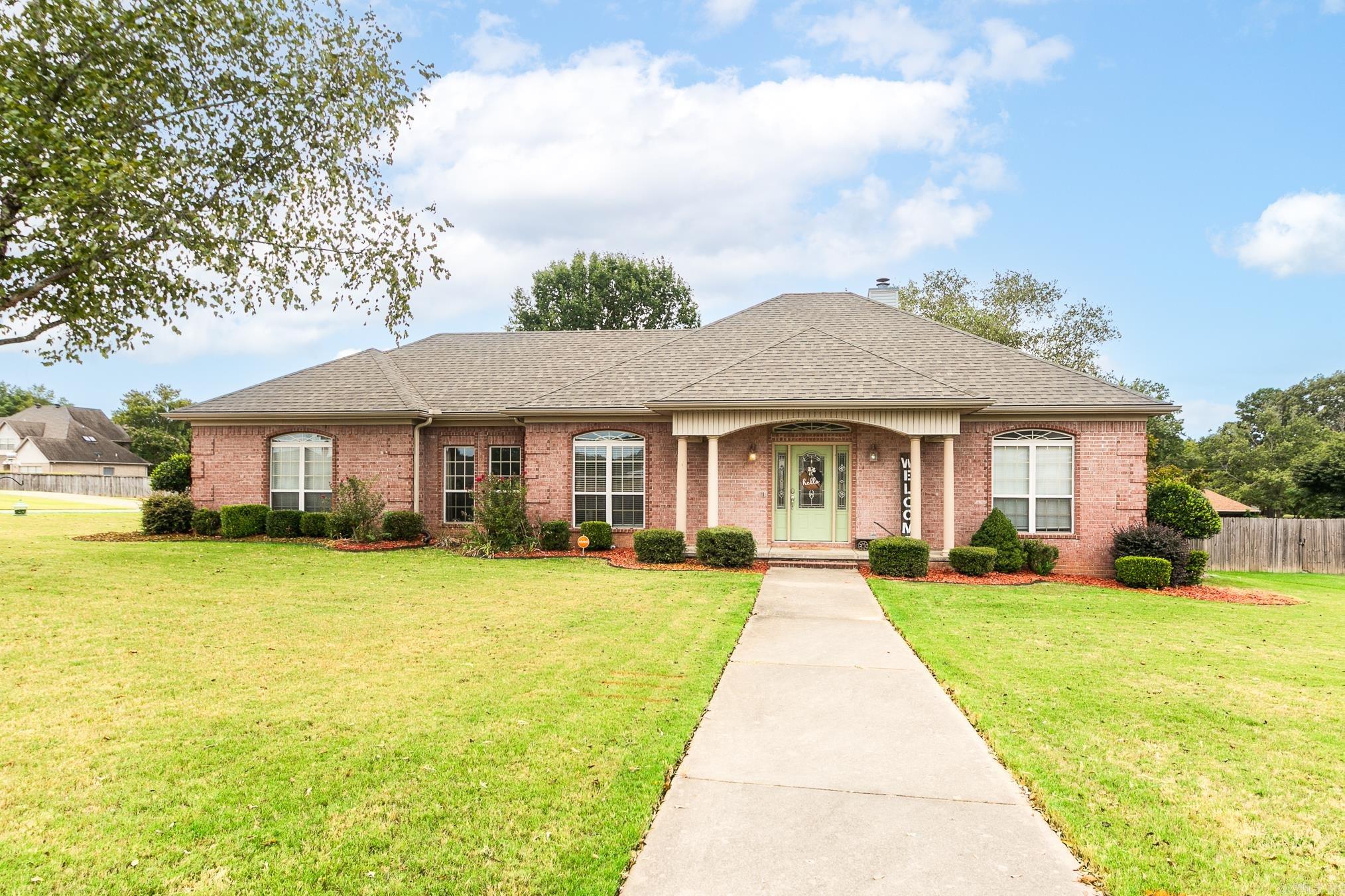 Welcome home to this Shiloh beauty that has so much to offer! The inviting foyer leads you to a large living room with fireplace. The semi open concept includes the dining area and the kitchen, which has pretty cabinets, a double oven, gas surface cooktop and breakfast bar. The adjoining space can be used as a breakfast room or office. Large laundry room with sink. Master bedroom is separate and has a walk-in closet that doubles as a safe room. The master bathroom has 2 sinks, separate tub and shower. The other 2 bedrooms are spacious with nice sized closets. Off of one of the guest bedrooms is a large flex room for a craft room, a game room, a pool house or even 4th bedroom. It has a 1/2 bath and French doors leading to the outside pool area. Other amenities include - New roof in 2022, new hvac in 2025, salt water pool, paid off solar panels for super low utilities, new fence and privacy wall in 2020, extra large garage!