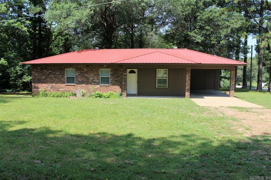 This 3 bedroom, 2 bath home is in a country setting but close to city limits. Sits on a large corner lot with plenty of room for kids to play or to plant a garden. This home is recently updated with new windows, fresh paint throughout, new flooring throughout, new bath vanities and a new tiled shower in primary bedroom. Call or text Sherrye McCoy at Diamond State Real Estate at 870-238-7700 or 870-318-8126 for your personal tour.