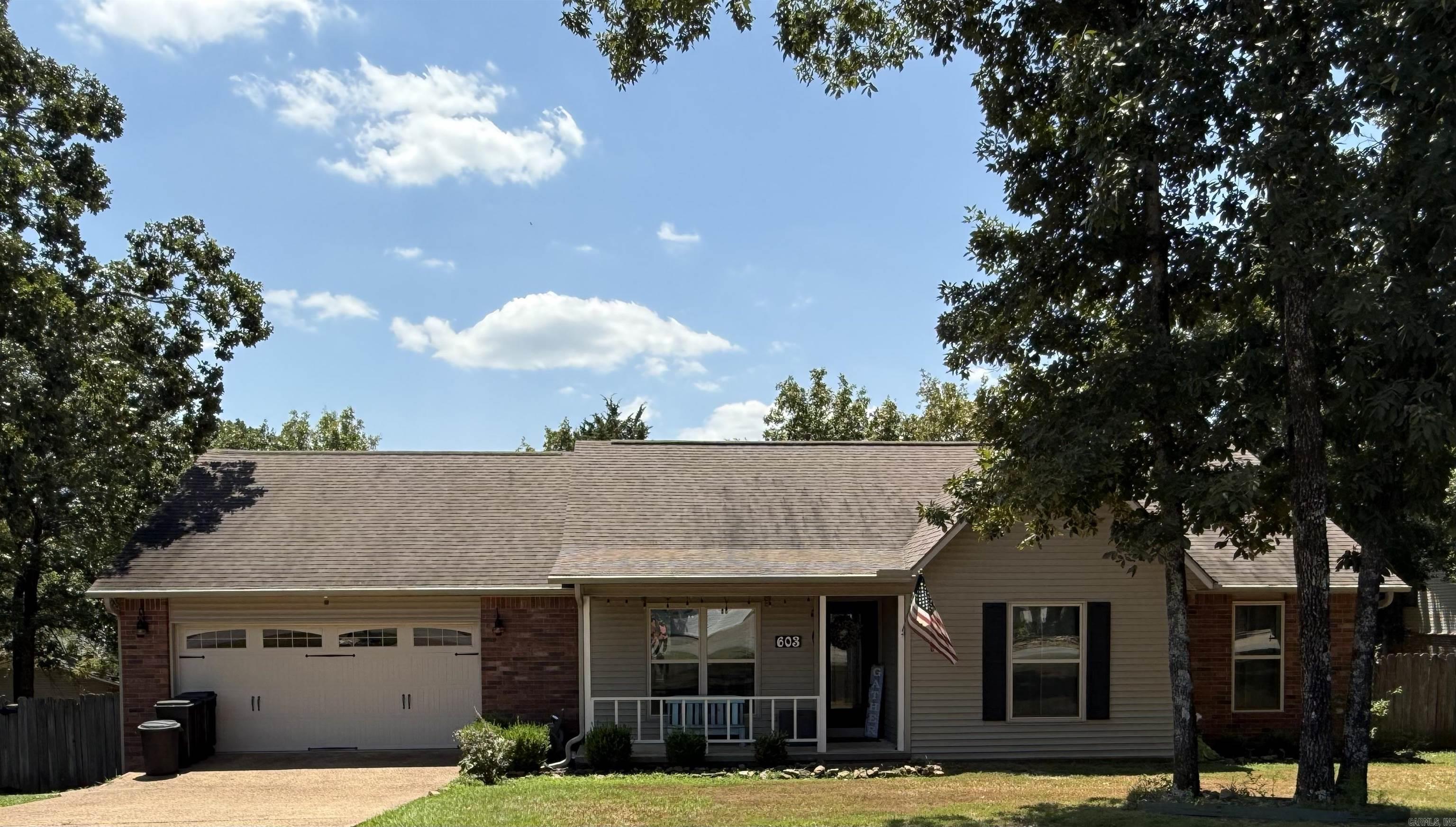 MOVE-IN READY-Beautiful 3 BR, 2.5-BA home on two lots, with room for your boat, RV, etc. Plenty of space for your family and pets. The roof, windows, and HVAC are 7-9 yrs old. The home features a living room with a gas fireplace, a large den with a half bath, and a golf cart garage with storage. Convenient to town, just 5 min. to Dam Site Marina, 3 min. to Thunderbird Golf Course. The stove and dryer can use natural gas or electricity. Entertain on your back deck with piped in natural gas grill. A beautiful cove on Greers Ferry Lake is within walking distance in this neighborhood. The home also had new gutters, water heater, disposal, and Vivant Smart Home Security System installed in 2021. A new gas range w/griddle was installed in 2024. Primary suite features double vanities, his/her closets, jacuzzi tub, and separate shower. The Vivant Smart Home Security System is paid in full and transferable to new owner with a low monthly fee for security coverage on doors/windows/exterior areas and includes surveillance camera above the garage door. Control your home, including the HVAC system, with the Vivant Smart Home. Be sure to check out the interactive CubiCasa Tour.