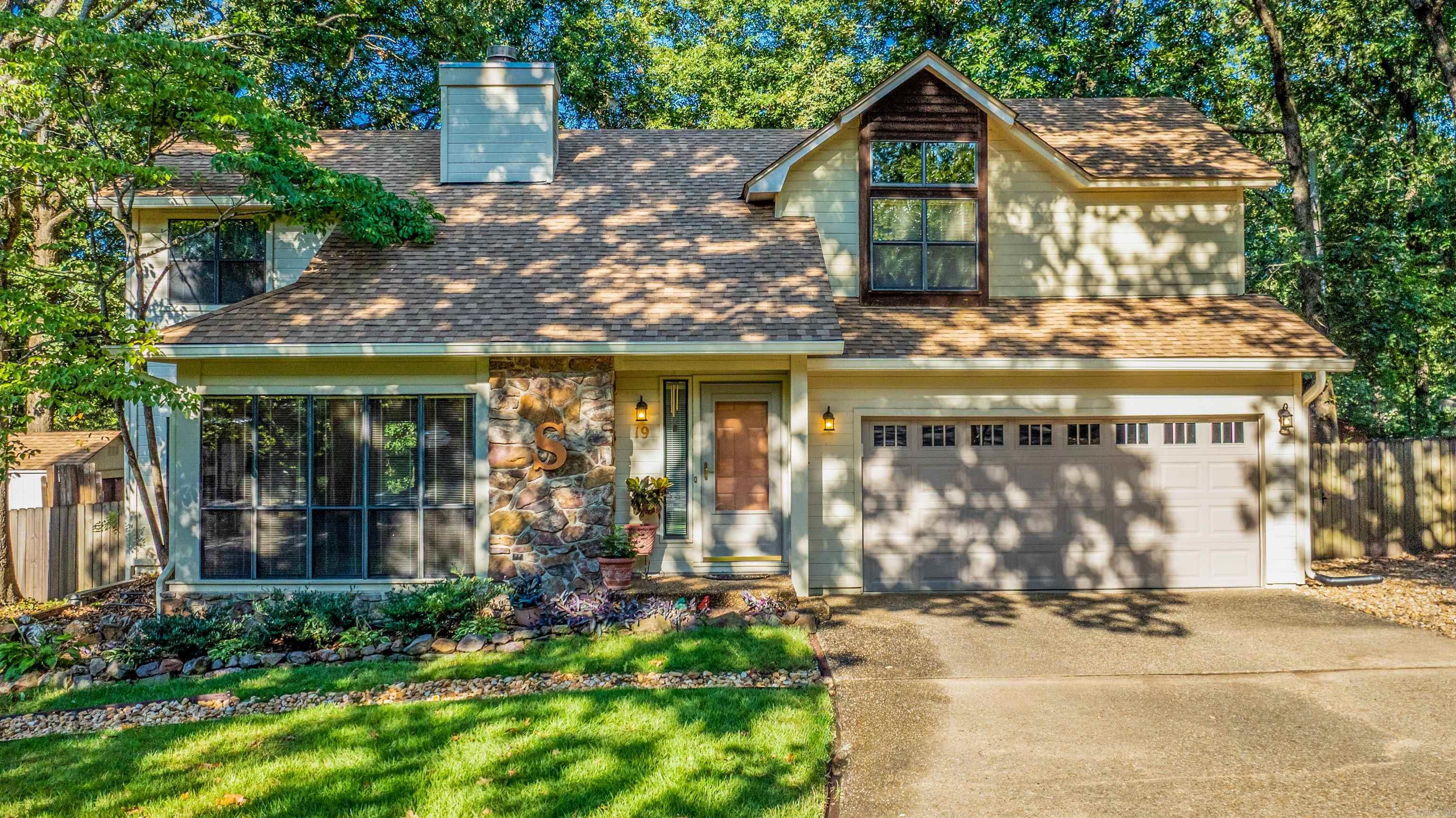 Wonderful home on a cul de sac in a great location and very desirable neighborhood. New roof installed August 2025. The kitchen has an abundance of beautiful wood cabinetry, gas cooktop on an island and is open to a sunroom that was added to provide additional living space and a cozy place to hang out. The family room has vaulted ceiling and a fireplace with gas logs. Primary bedroom is large with a nice sitting area and vaulted ceiling. Upstairs guest bedrooms were enlarged when the bonus room was added... providing large bedrooms with great closet space. There is an extra room that could be used as small office space or a craft room. The backyard is oversized and includes a 16' x 16' low deck... perfect for entertaining or just admiring your backyard that has no pine trees...just oak and hickory. If you love gardening, there is an outdoor shower for easy clean up. There is a separate meter faucet for outdoor watering. In addition, there is a 10' x 10' shop with electricity. 9' wide gate alongside garage.