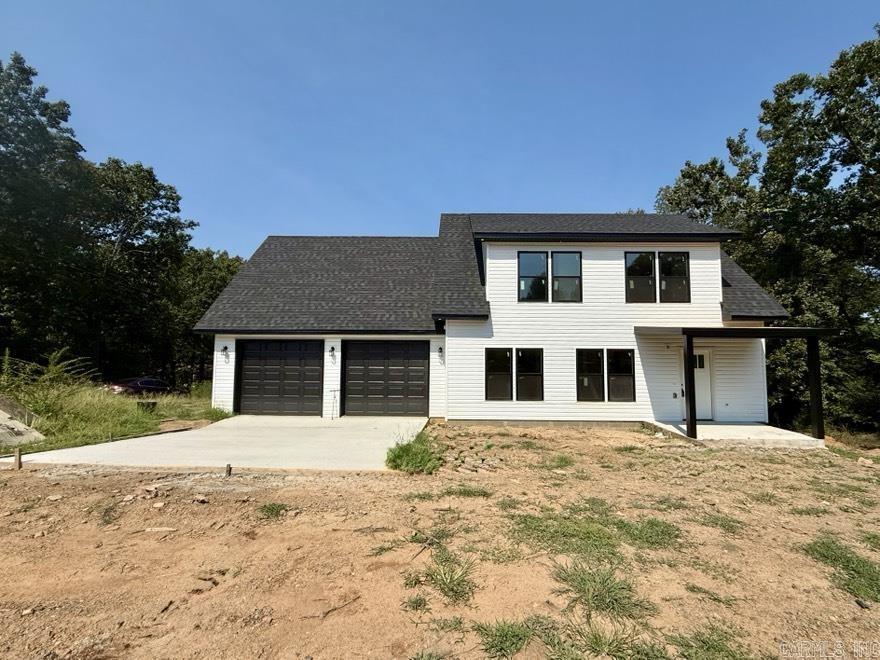 Estimated date of completion: September 1. Brand new custom-built home on a spacious 0.34-acre lot, priced at $245,000! This 3 bed, 2 bath home offers 1,544 sq ft of quality craftsmanship featuring granite countertops and stainless steel appliances, custom cabinetry, and tiled showers in both the master and guest bathrooms. Luxury vinyl plank flooring in the living room, kitchen, bathrooms and carpet in bedrooms. The open-concept layout, two-car garage, and large lot size make this home perfect for both comfortable living and entertaining. Outside of city limits. Conway School District. Close to interstate access.