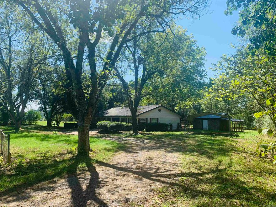 This spacious 3 bedroom, 2 bath home boasts 2,162 sf of comfortable living space, nestled on a generous 1.36 acre parcel of land. The home features a fireplace, covered patio in back inviting you to take in the scenic views of the property,  covered porch in front, outbuildings offering extra storage. With ample outdoor space, this property has room for gardening, playing games or simply enjoying the fresh air.  Call today for a showing.