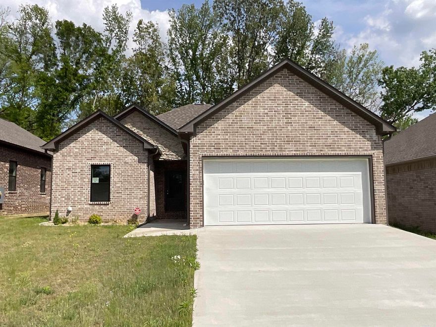 This NEW CONSTRUCTION house exudes warmth, from the vaulted wood ceiling to the toffee-colored kitchen cabinets! Such a great location in Jacksonville: between Little Rock Air Force Base and the interstate! Great-sized lot, all wood cabinets, solid-surface countertops, 9' ceilings. and beautiful covered porch with access from the primary bedroom! Would make a great home for someone wanting style and convenience! Agents, please see remarks!