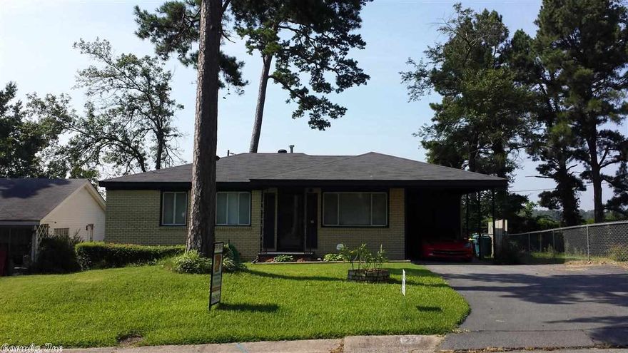 Wonderfully up-kept brick home in quiet and stable neighborhood. Newer paint inside and outside.  Newer roof, furnace, AC compressor, water heater, carpet and ceiling fans, light fixtures, closet doors and mini blinds on most windows.  Manicured lawn, laundry room/storage room and extra parking pad make this property excellent for your investors or first time home buyer.  The kitchen is NOT remodeled!  Show today to your qualified buyers.  Move in ready!