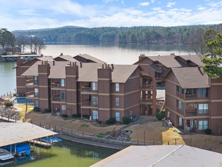 Looking for the perfect place to call home? Check out this gem at 152 Mimosa Point in a lovely gated community! This two-bedroom, two-bath haven offers stunning views of Lake Hamilton that you won’t want to miss. Step inside to find a beautifully remodeled kitchen complete with new appliances and sleek granite countertops – perfect for whipping up your favorite meals or entertaining friends. The master bathroom has also been updated, featuring a fantastic shower and elegant granite touches that elevate the space. With 1,141 square feet, the living area is warm and inviting. The layout flows perfectly, giving you plenty of room to relax and enjoy life. Location is key, and this property doesn’t disappoint. Nestled in a gated community, you'll revel in peace and security while still being close to everything you love about Hot Springs living. Imagine sipping your morning coffee on the patio, soaking in those stunning lake views. Don’t miss out on this amazing opportunity to make this charming spot your new home! See agent remarks.