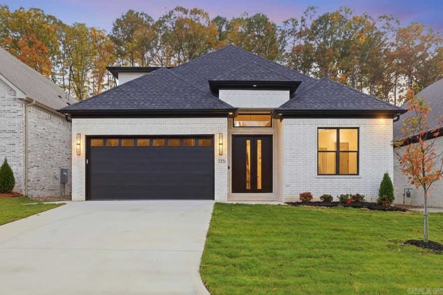 Welcome to Kinley Ridge, one of the newest Chenal communities! This stunning home is within walking distance to the new community POOL and PARK opening up Summer 2026! Step into style in this beautifully designed two story home. Downstairs the spacious kitchen is the star of the show. It showcases custom cabinetry to the ceilings, high end appliances, and ample countertop space. The kitchen overlooks an open living area with an extra large sliding door opening up to a private covered patio. You'll also find 2 bedrooms with their own en-suite bathrooms, a half bath for guests, and a beautifully functional laundry room on the main level. Upstairs you're welcomed by a large landing area, perfect for a playroom, media room, or secondary living area. You'll find 2 more bedrooms and a full bathroom, as well as attic access for extra storage space. This home is almost complete, please pardon our progress as finishing touches go in to create a truly unique and inviting space!