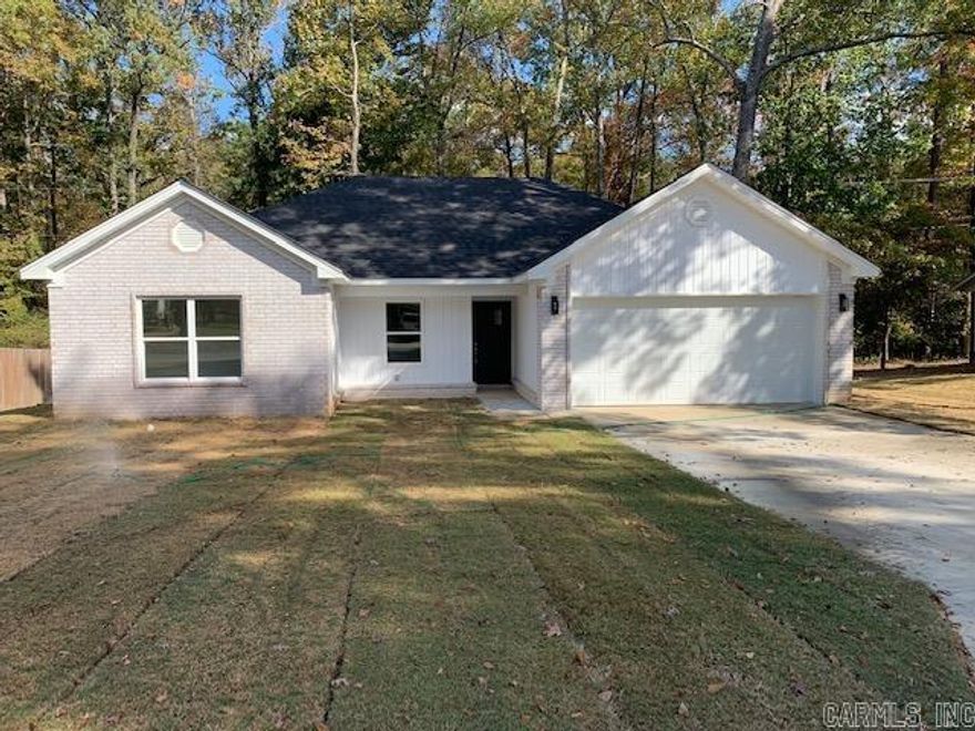 NEW CONSTRUCTION!  Home features custom cabinets, granite countertops, and stainless steel appliances. This beautiful home offers 4 bedrooms with 2 full bathrooms. Living room and entry has tall ceilings. Split bedroom floor plan with separate laundry room.   Master bedroom has walk-in closet.  Large windows and glass door brings in natural light.  Nice private patio area perfect for entertaining!