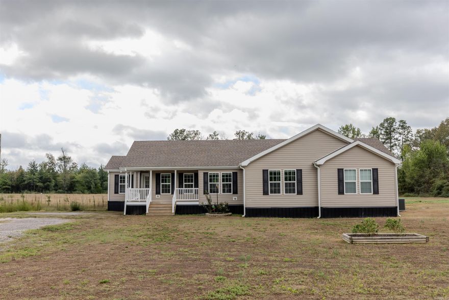 Built in 2019, this charming country home sits on 6.47 acres and includes a 30’x40’ shop with 200-amp service and concrete floors. Attached is a 10’x35’ barn equipped with both power and water, making it perfect for livestock or storage.  The land is fully fenced and cross-fenced, ideal for grazing animals or rotating pastures. You’ll also find raised garden beds and plenty of wildlife roaming the property, giving it a true homestead feel.  Inside, the home offers 4 bedrooms, 2 bathrooms, and an open-concept kitchen, dining, and living area—great for everyday living and entertaining. Fiber internet is available, making it easy to work from home while enjoying the peace of the countryside.  All this just a short drive to Conway—come start your homestead dream here!