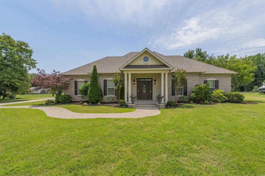 Hard-to-find one-level brick home on 3 acres with a detached brick shop, 3-car garage, and extra parking pad. Right at 3,000 square feet with wood flooring, fresh paint, separate dining room, and an updated kitchen with refreshed countertops and hardware The primary suite offers a beautiful tiled walk-in shower, soaking tub, and large walk-in closet. French doors open to the 4th bedroom, giving the perfect office or flex space option. Geothermal system, sprinkler system, and built-in speakers throughout add comfort, efficiency, and convenience to this exceptionally well-kept property.