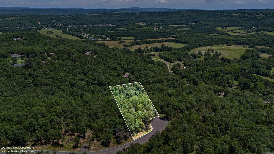 Discover the potential of this 2.29-acre wooded lot in a charming small town, offering future bluff views of the city and mountains once cleared. Situated on paved roads with utilities at hand, it's primed for your dream retreat. Unveil the beauty of the landscape as you carve out your sanctuary, where serene vistas await. Seize the opportunity to craft your ideal haven amidst nature's grandeur.
