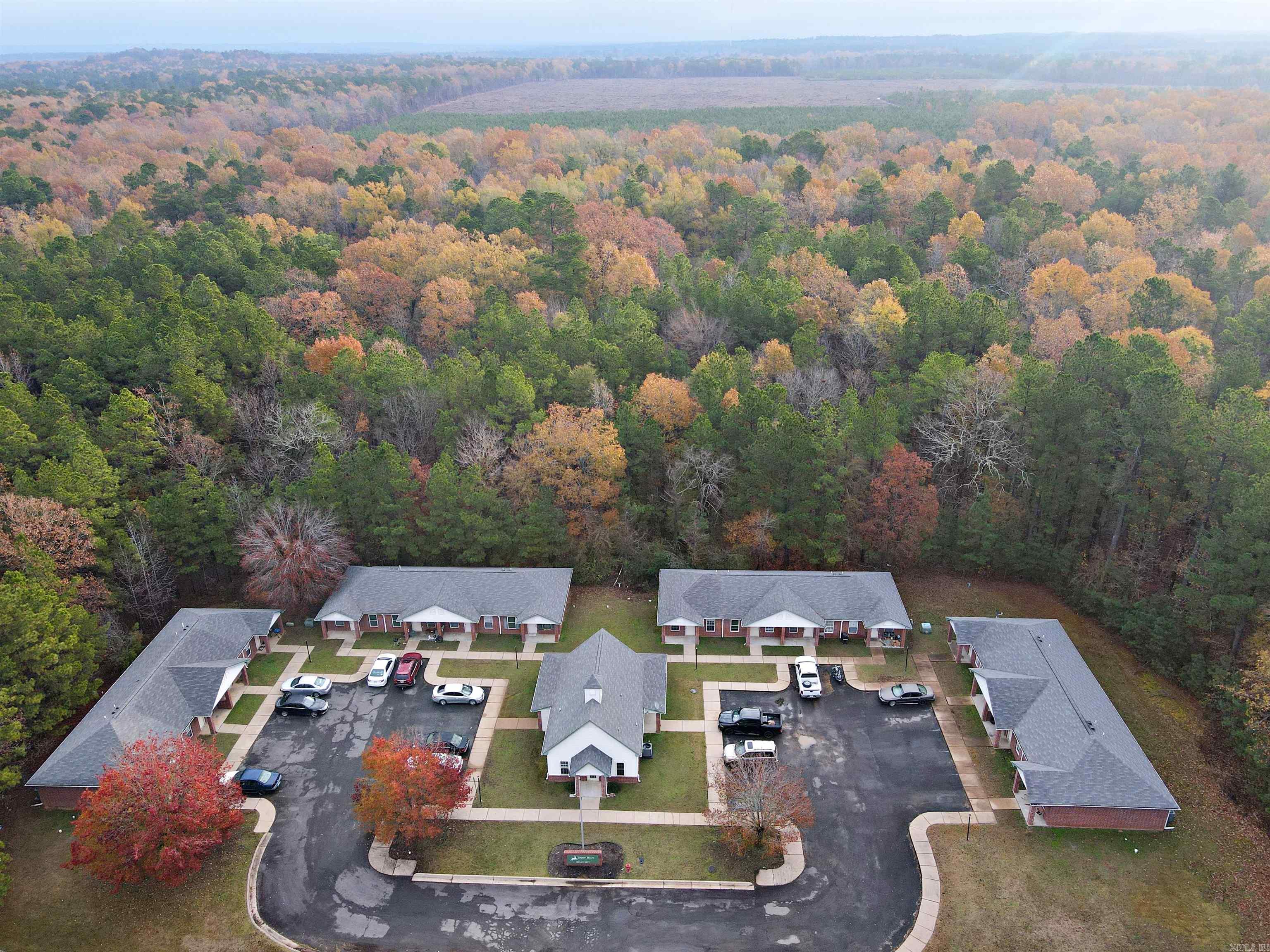 Investment Opportunity! Quaint apartment complex surrounded by mature trees and nestled at the end of a quiet street. This complex offers 17 well maintained, updated units and long term tenants love the seclusion this property offers. All units are one level with covered front porch.