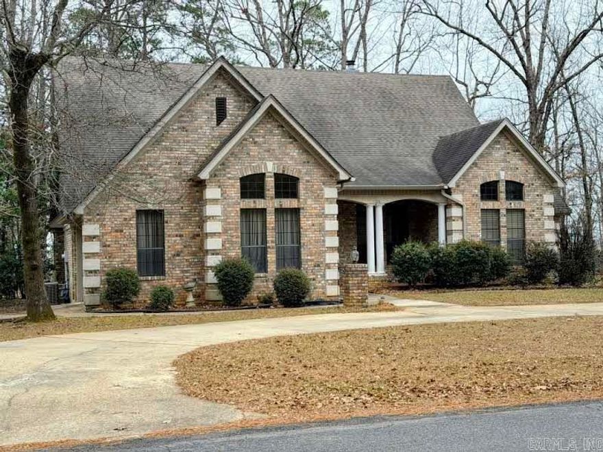 Charming 3-Bedroom, 2-Bath Home with Bonus Room and Upgrades Throughout! Step into this beautifully designed home built in 1998, offering comfort, character, and space. The living and dining rooms feature stunning 10-foot ceilings and a cozy gas log fireplace with built-in bookcases on both sides, creating an inviting focal point. The master suite boasts a cathedral ceiling, a stained-glass window, and French doors leading to the deck. The master bathroom includes two sinks, dual closets, a soaking tub, and a stand-alone shower. One of the additional bedrooms also has its own exterior door to the deck, ideal for guests or a home office. A bonus room above the garage provides flexible space—with a private balcony and plumbing in place to add a bath—perfect for a future guest suite or studio. Additional highlights include a pull-down 700 sq. ft. floored attic, ideal for storage, a single-car garage with storage and exterior access, and a 6x8 storage building. Relax or entertain outdoors on the spacious deck, accessible from multiple rooms—this home offers thoughtful design and timeless features throughout.