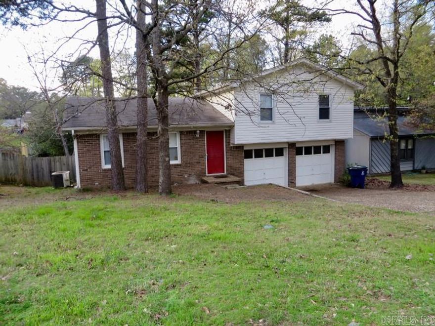 Adorable home in Maumelle!!  Features include 3 bedroom, 2 full baths, Nice living room with brick mantle woodburning fireplace, wet bar and French doors overlooked spacious deck! Master suite with attached bath.  Huge fully fenced level backyard perfect for kids!!  2 car garage with workshop!  NEW Carpet, NEW Paint, Newer Roof, Siding, HVAC & HWH  NO SIGN IN YARD!