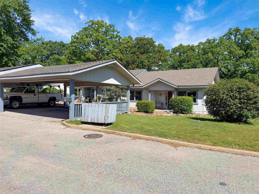 Discover the perfect blend of comfort and convenience in the heart of Cherokee Village! This charming single-story end unit townhouse with covered parking offers a rare sense of privacy and tranquility, featuring a large sunroom at the back where you can unwind while enjoying serene views of the surrounding woods. Inside, you’ll find a thoughtfully designed, spacious layout boasting two bedrooms connected by a functional Jack and Jill bathroom. Whether you are looking for a full-time residence or a weekend getaway, this home is designed for those who appreciate low-maintenance, easy living without sacrificing quality or space. Location is everything, and this property delivers. You are just moments away from the scenic South Fork of the Spring River, seven pristine lakes, and two championship 18-hole golf courses. From kayaking and fishing to hitting the links, outdoor adventure is always at your doorstep. Don't miss this opportunity to own a slice of Arkansas beauty at an unbeatable, affordable price. Experience the best of Cherokee Village living today!