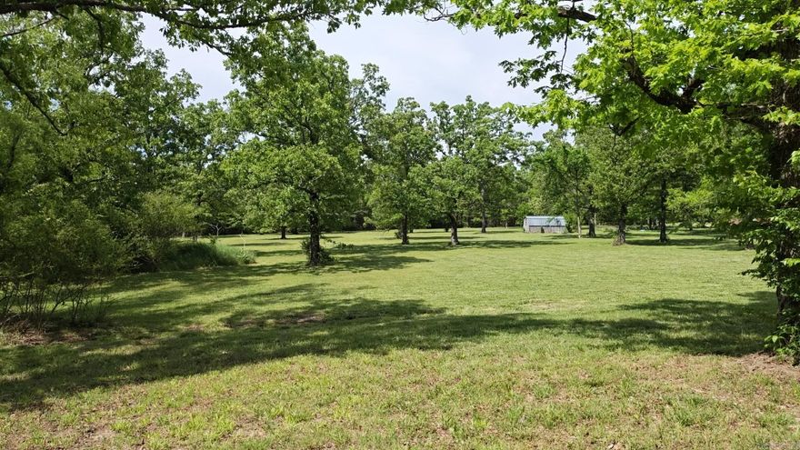 Build your dream home on this beautiful 5.38-acre property nestled in a quiet, park-like setting in Mountain View, Arkansas. Featuring large mature trees and a peaceful atmosphere, this property offers the perfect blend of privacy and convenience.  Paved street access  All utilities available along the front of the property  Quiet neighborhood  Minutes from the hospital, schools, shopping, restaurants, and Mountain View’s famous live music scene  Whether you’re looking to build your forever home, retirement retreat, or investment property, this scenic lot offers endless possibilities in one of Arkansas’s most charming communities.  $150,000.00  Call today for more information or to schedule a showing!