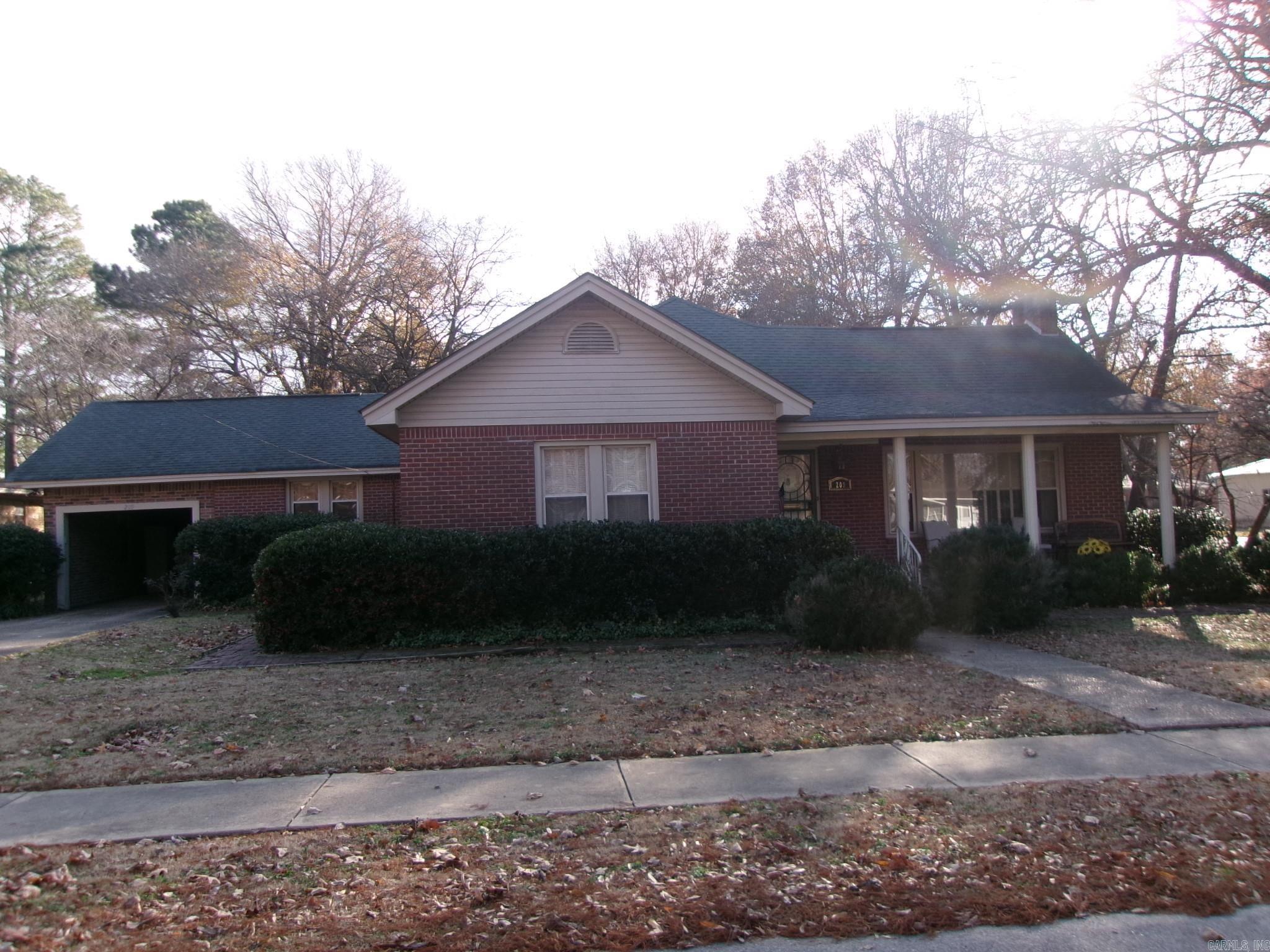 Shaded corner lot with large shop with loft. Fireplace, 3 bedroom, 2.5 baths.