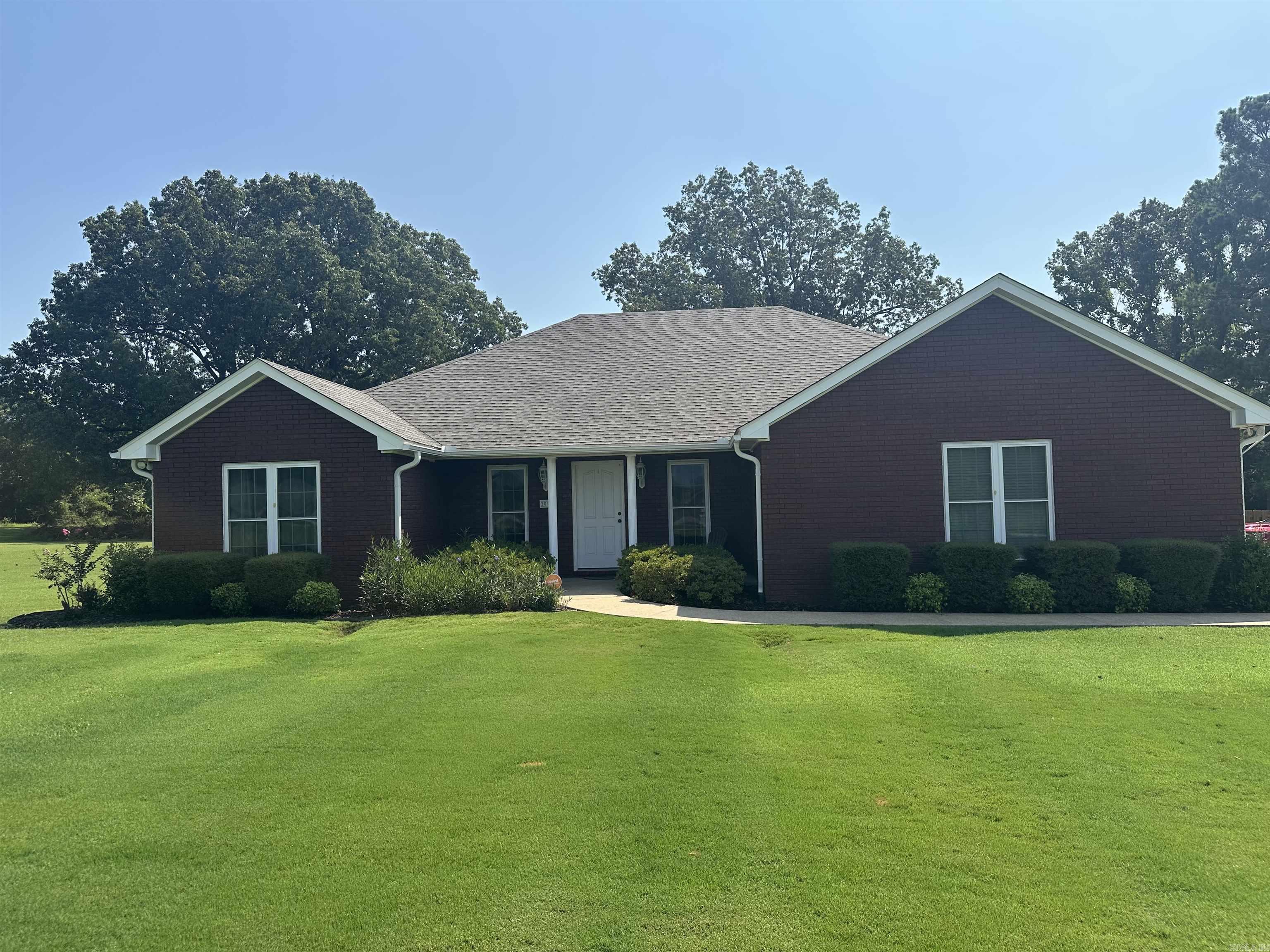 Looking for an exceptional residence along with an expansive outdoor living space? This all brick home is a must see!!! Upon entering you will discover a large living area with an open dining room and kitchen. The kitchen with an abundance of cabinets and an island make this one you will love to spend time in. The primary bedroom is complete with a large walk-in shower and plenty of closet space. You will enjoy the split floor plan, with good sized bedrooms that both have walk-in closets. A spacious garage completes the home. Now let's go outside.....The outdoor living space includes an above ground pool with a large deck that has plenty of room to entertain and cool off on these hot summer days. There is also an outdoor metal building that could be used for many different things. It opens on each end and is heated. It is presently being used has a place to have hitting practice. The yard is fully fence. This property, conveniently situated near town amenities, close to hospitals, eating places, churches and anything else you might be looking for. This is a must see home and is located in the Brookland school district.